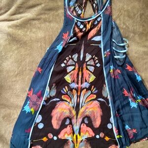 Free People sundress w/ side cut-outs. Size XS. Perfect condition (never worn)!